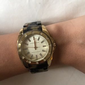 Tortoise and gold men’s style wrist watch